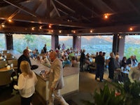 a group of people at a restaurant