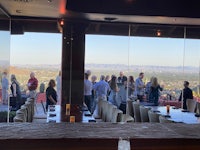 a restaurant with a view of a mountain