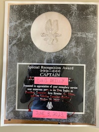 a plaque with a special recognition award on it